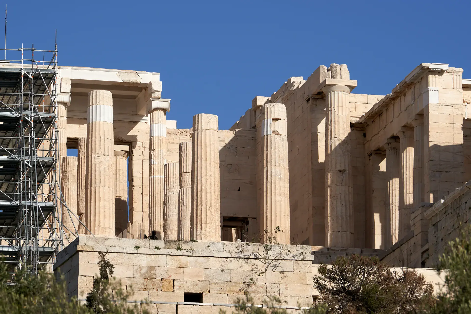 The Propylaea gateway showing its massive Doric columns and monumental entrance portal leading to the Acropolis summit