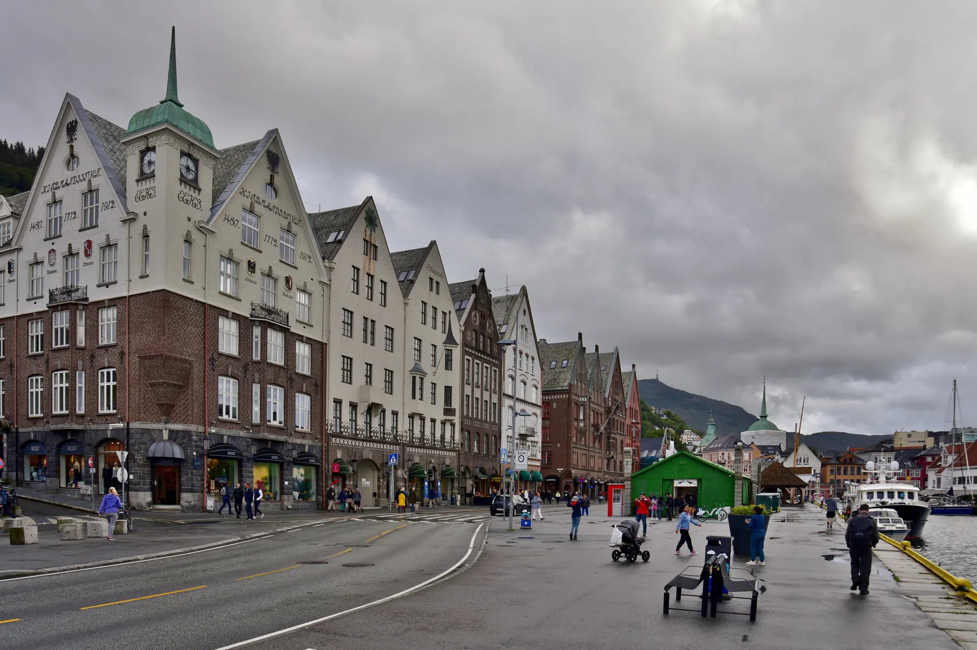 Colorful painted wooden facades of Bryggen buildings showing traditional Norwegian timber architecture along the waterfront