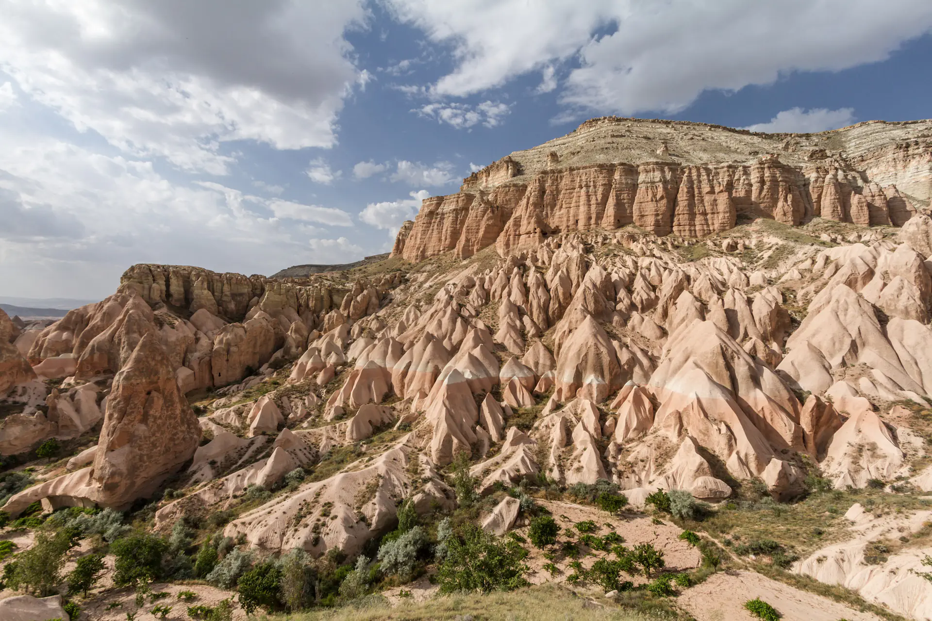 Mount Aktepe seen from Rose Valley with fairy chimney rock formations in Cappadocia