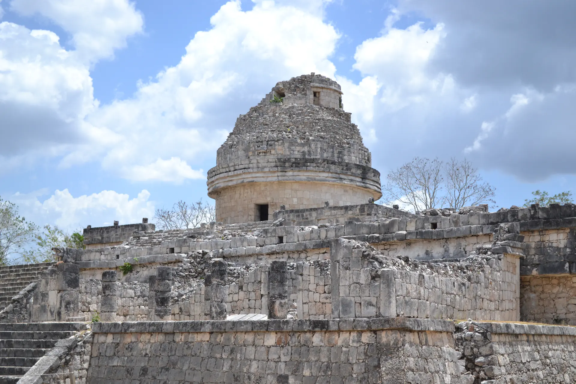 The cylindrical El Caracol observatory building showing its distinctive circular architecture at Chichen Itza