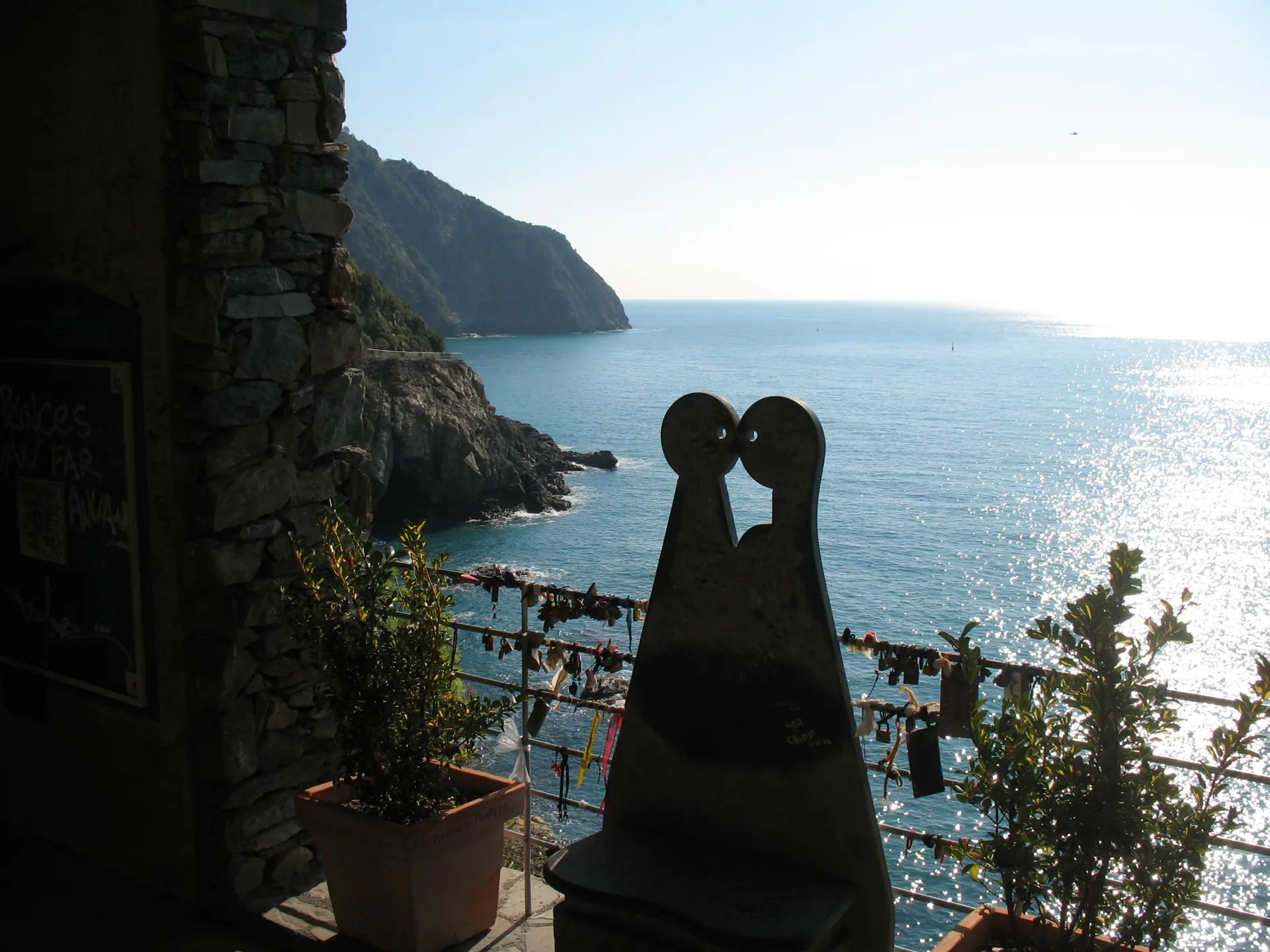 The romantic Via dell'Amore tunnel carved through coastal cliffs between Riomaggiore and Manarola with Mediterranean views