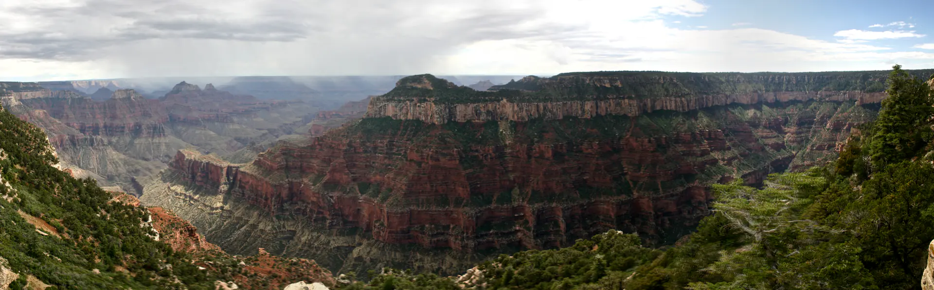 Sweeping panoramic view of Grand Canyon North Rim showing dramatic wilderness perspectives and expansive canyon vistas