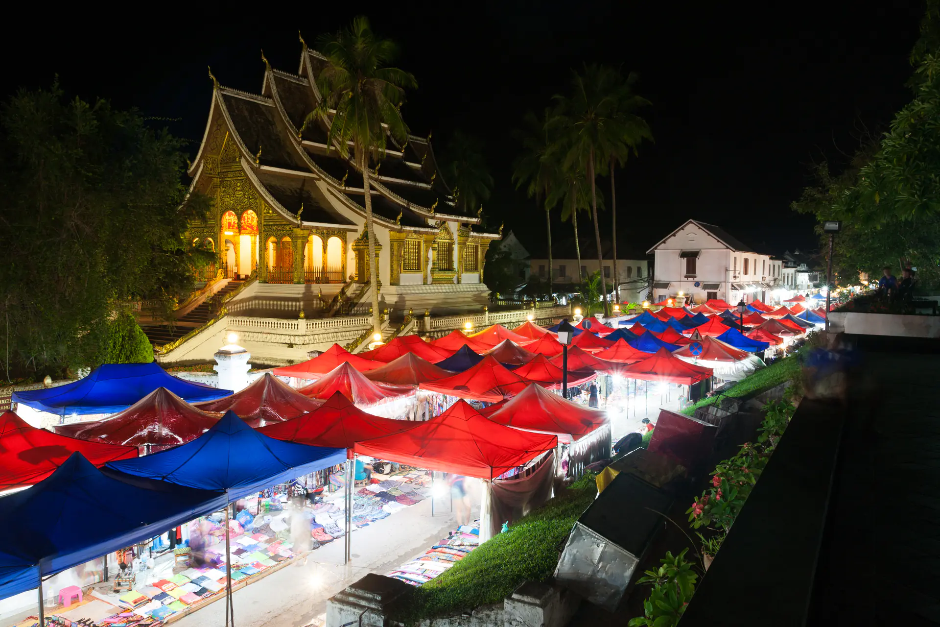 Colorful traditional Lao handicrafts and textiles displayed at the evening night market in Luang Prabang