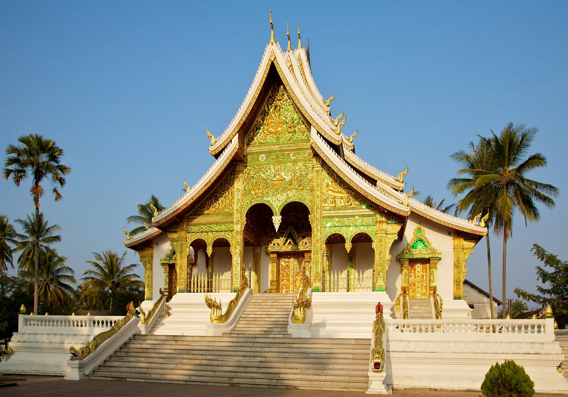 Scenic view of Luang Prabang showing the Royal Palace Museum grounds with Mount Phousi temple rising in the background