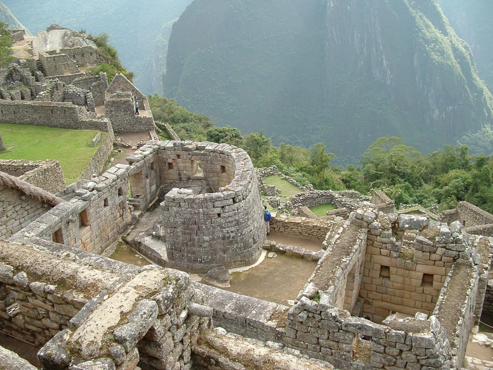 The semicircular Temple of the Sun at Machu Picchu showing the sophisticated stonework and trapezoidal windows aligned for astronomical observations