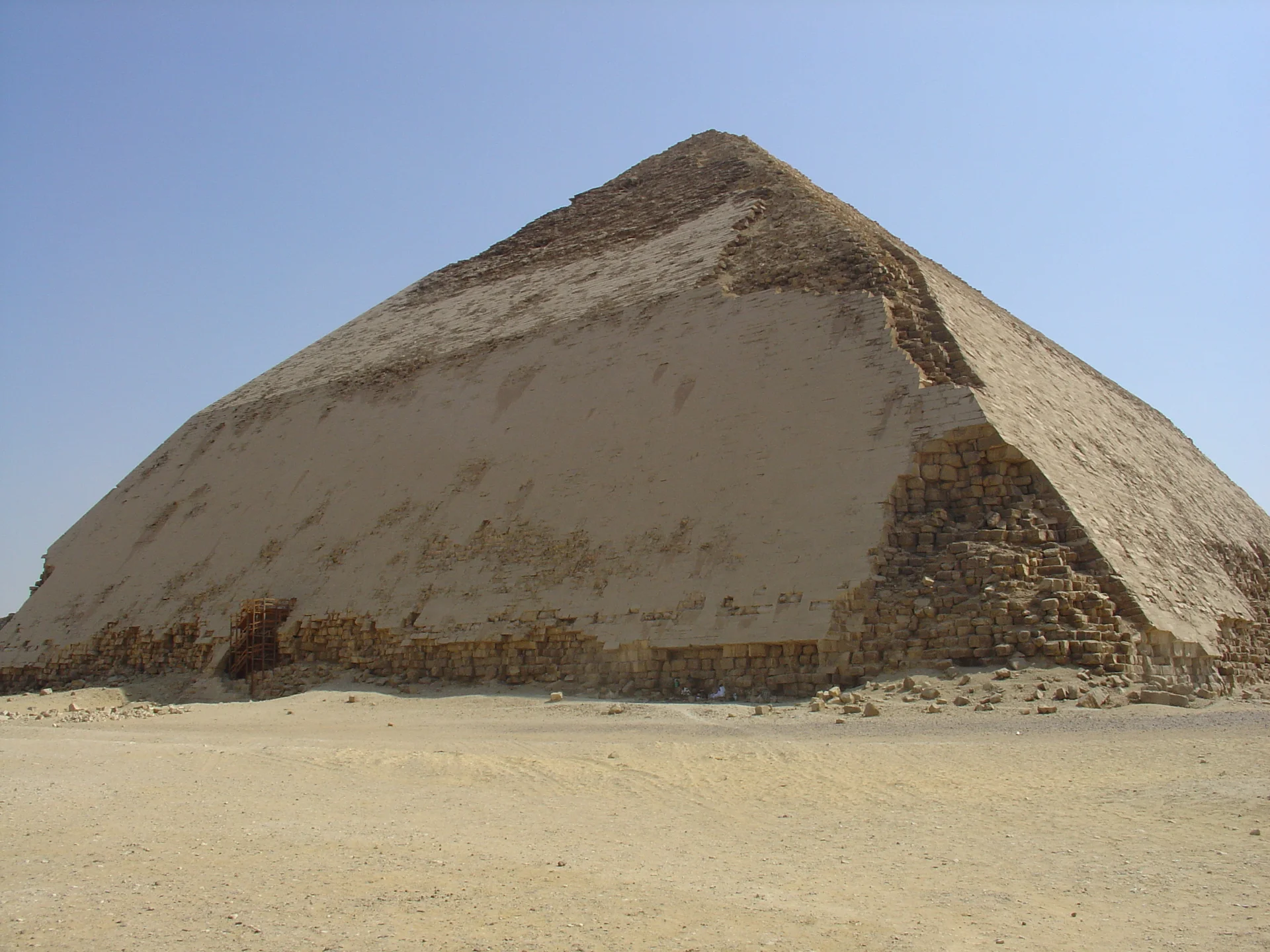 The Bent Pyramid at Dahshur showing its distinctive change in angle and well-preserved limestone casing that demonstrates how pyramids originally appeared