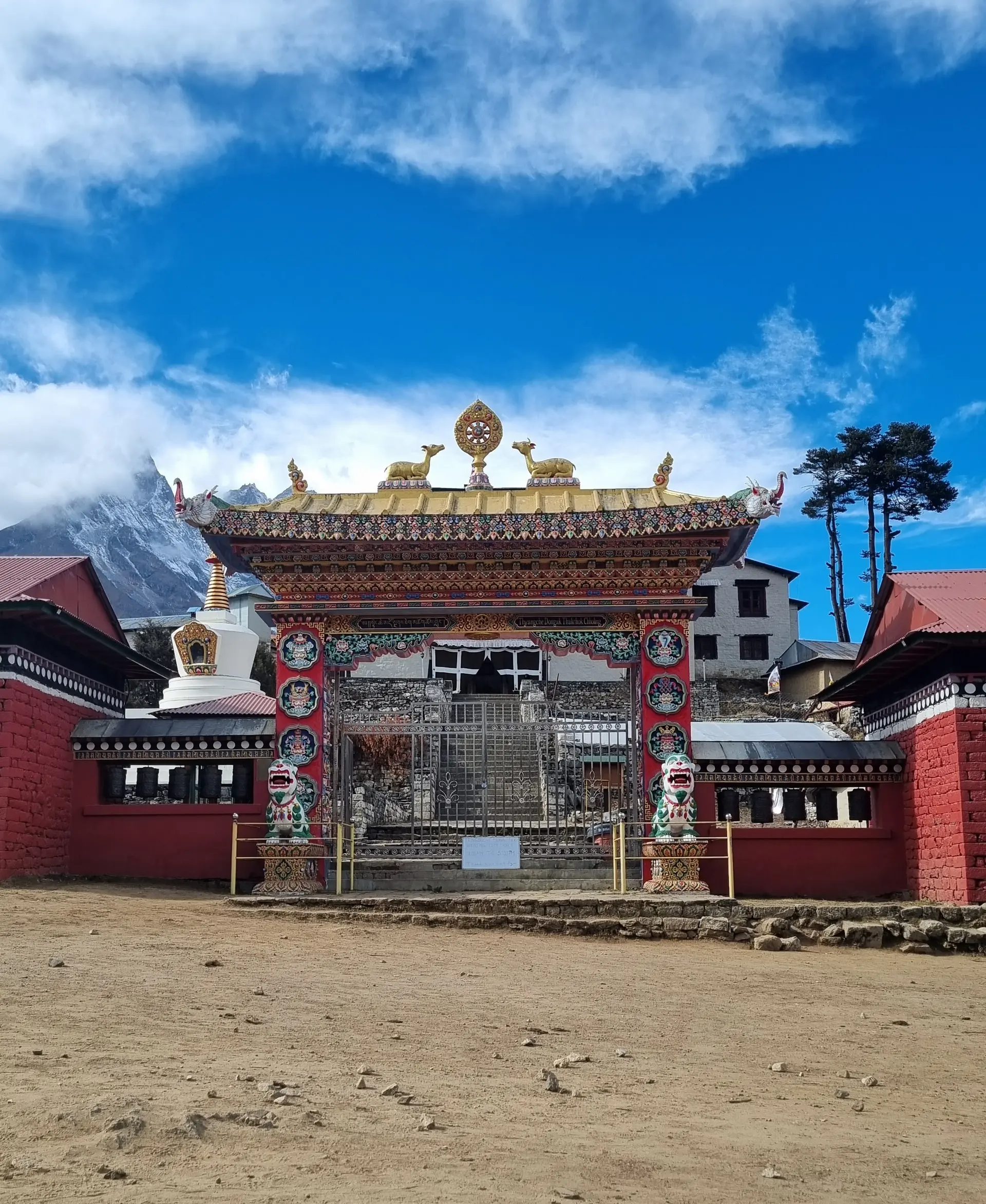 Tengboche Monastery with traditional Tibetan Buddhist architecture and Mount Everest visible in the background