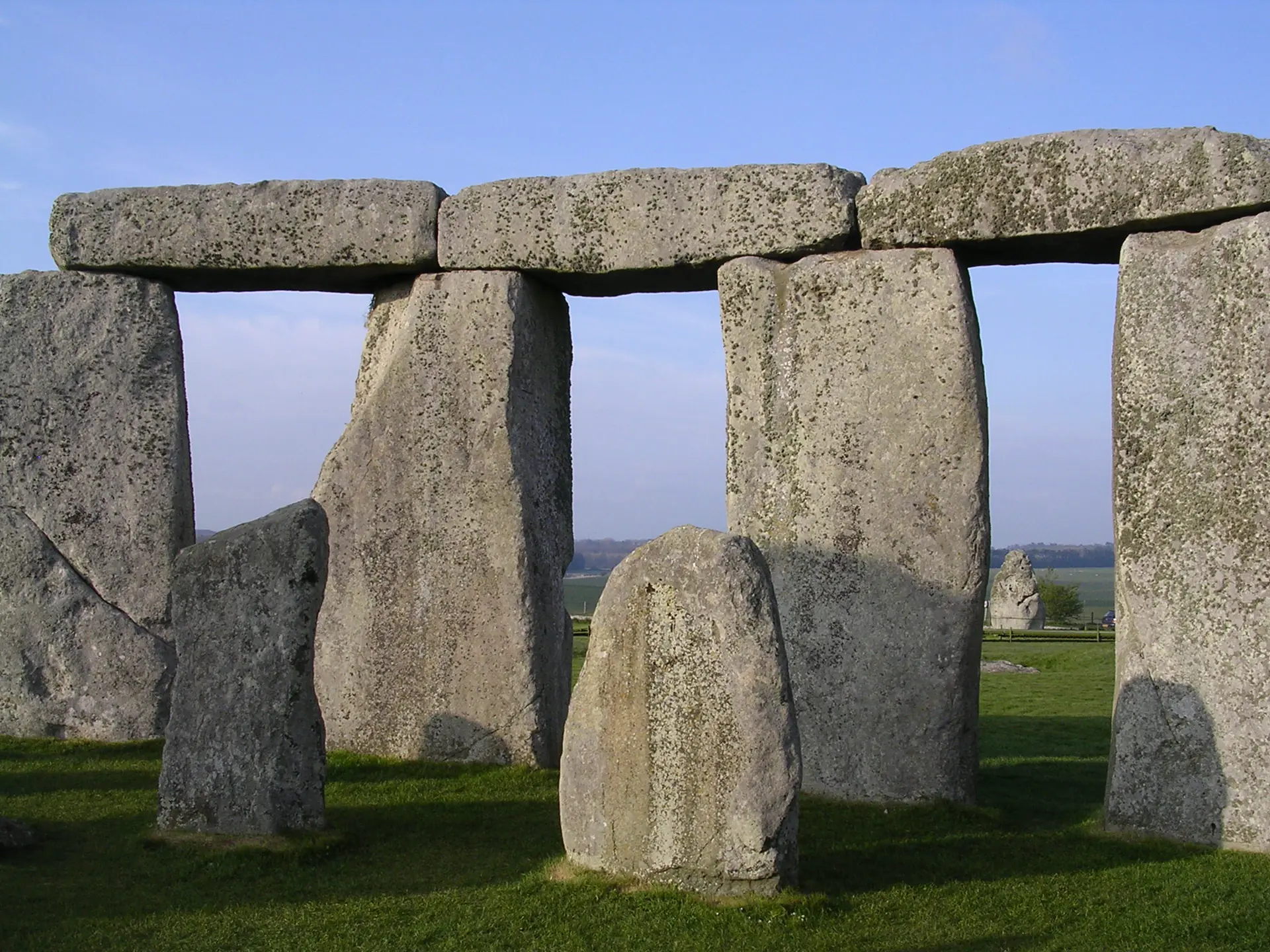 Interior view of Stonehenge stone circle facing northeast, showing massive trilithons and standing stones from within the monument